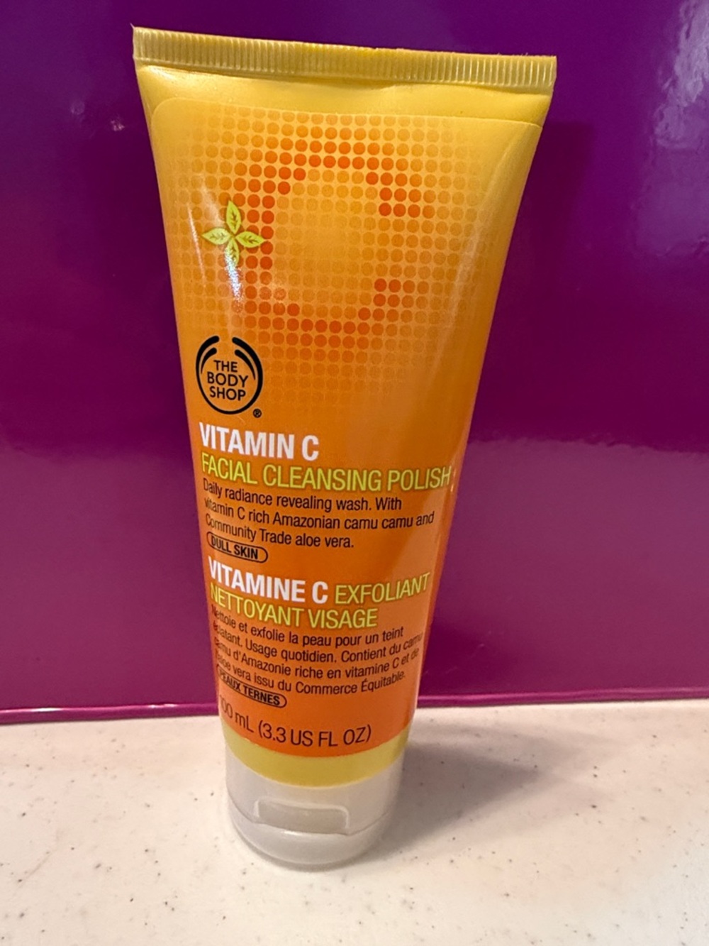 The Body Shop Vitamin C Facial Cleansing Polish - Orange and Yellow Tube